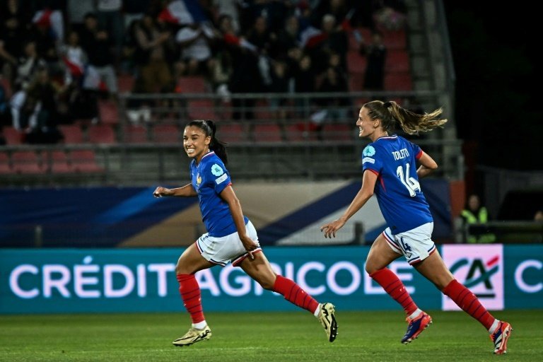 Sakina Karchaoui's long-distance screamer helped ensure France's place at Women's Euro 2025 on Friday as they emerged 2-1 winners against Sweden in League A qualifying, while England beat the Republic of Ireland to close in on qualification.