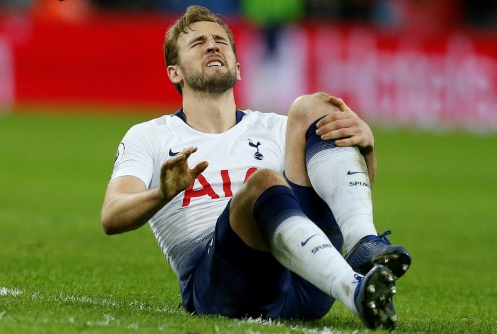Harry Kane will be out until March with ankle ligament damage. AFP