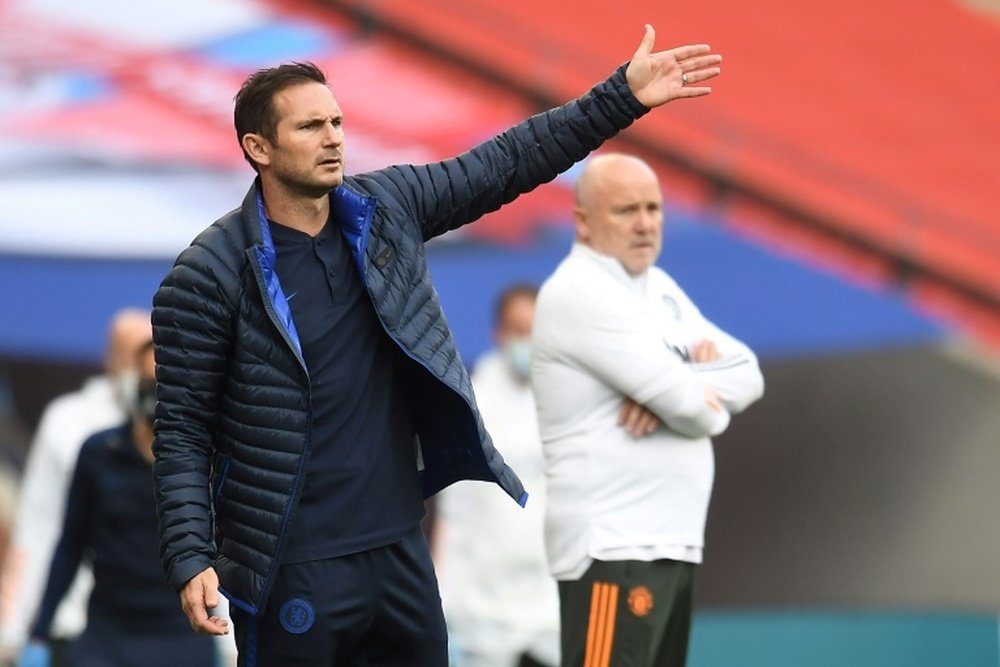 Lampard says Chelsea are a long way behind Liverpool. AFP
