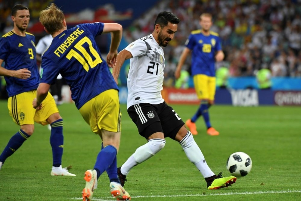 Gundogan says he wants to keep playing for Germany. AFP