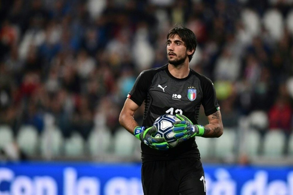 Juve goalkeeper Perin, Behrami return to Genoa. AFP