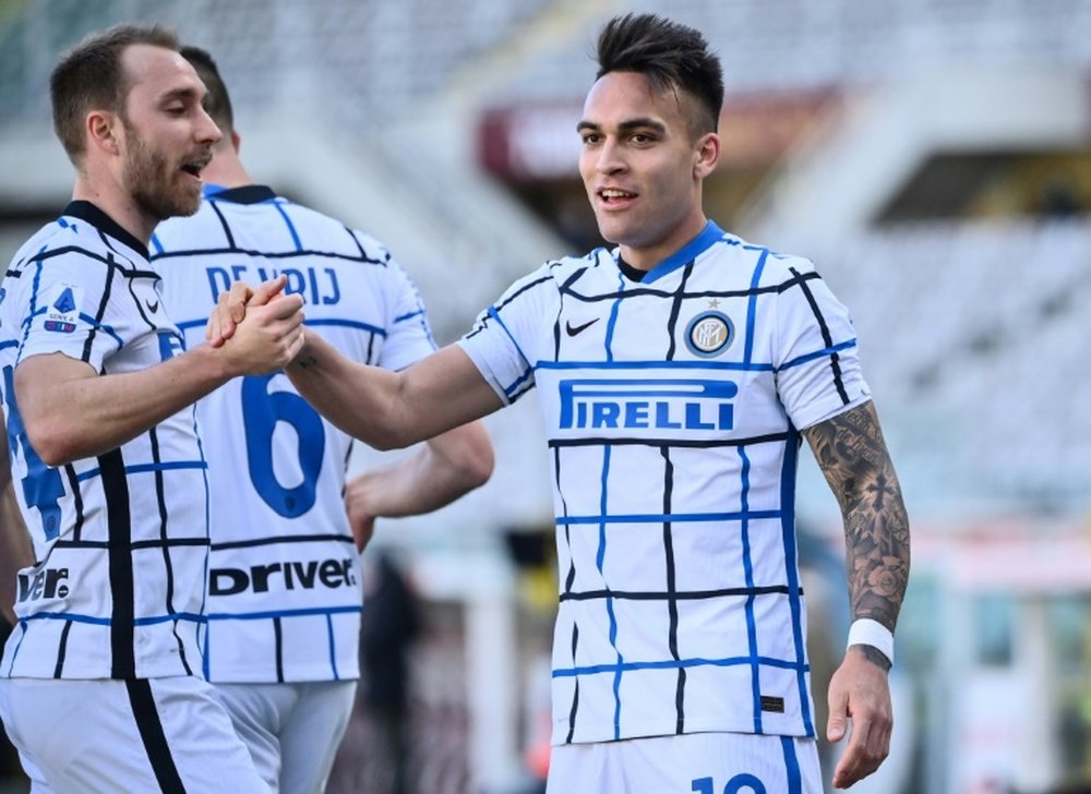 Lautaro Martinez (R) got the winner for Inter at Torino. AFP