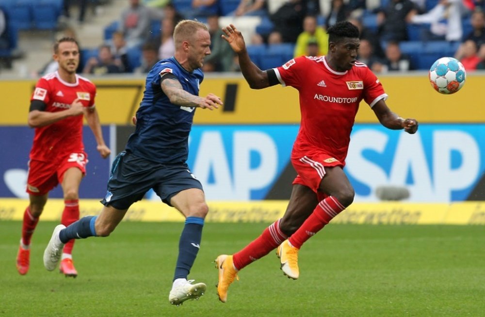 Taiwo Awoniyi (R) scored as Union Berlin drew at Hoffenheim. AFP