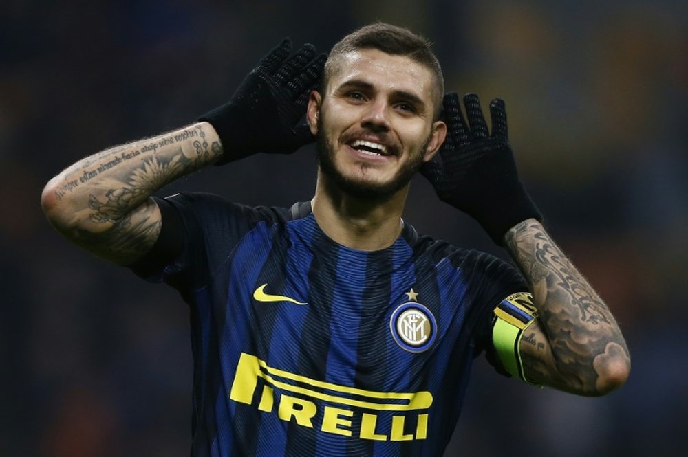 Inter Milans forward Mauro Icardi celebrates after scoring. AFP