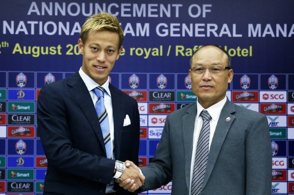 Honda will help coach Cambodia's national side. AFP