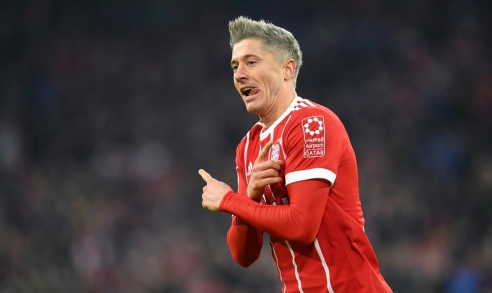 Lewandowski struck twice for Bayern in a 3-0 victory against Augsburg. AFP