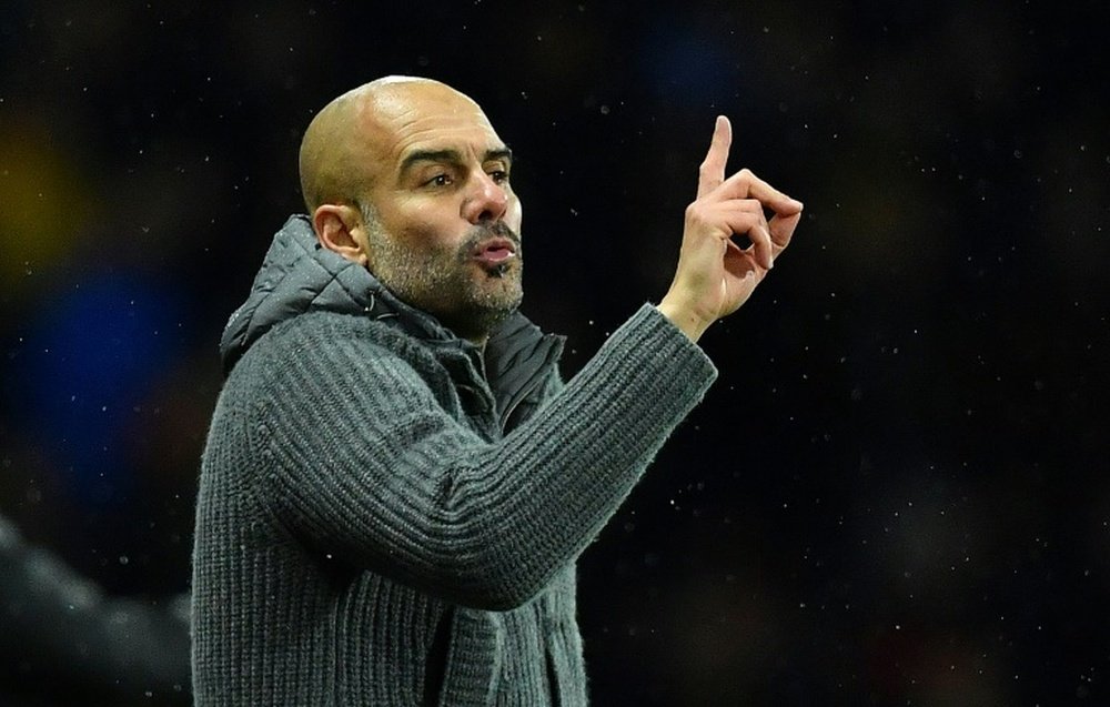 Guardiola has issued a stern warning to his players. AFP