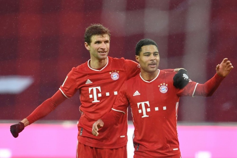 Thomas Muller and Serge Gnabry are back in training for Bayern. AFP