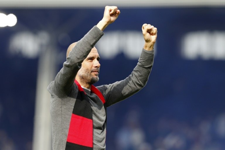 Guardiola was delighted with his team. AFP