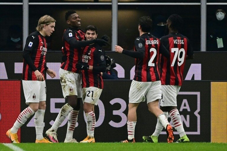 Rafael Leao (2L) scored as AC Milan beat Torino 2-0 on Saturday. AFP