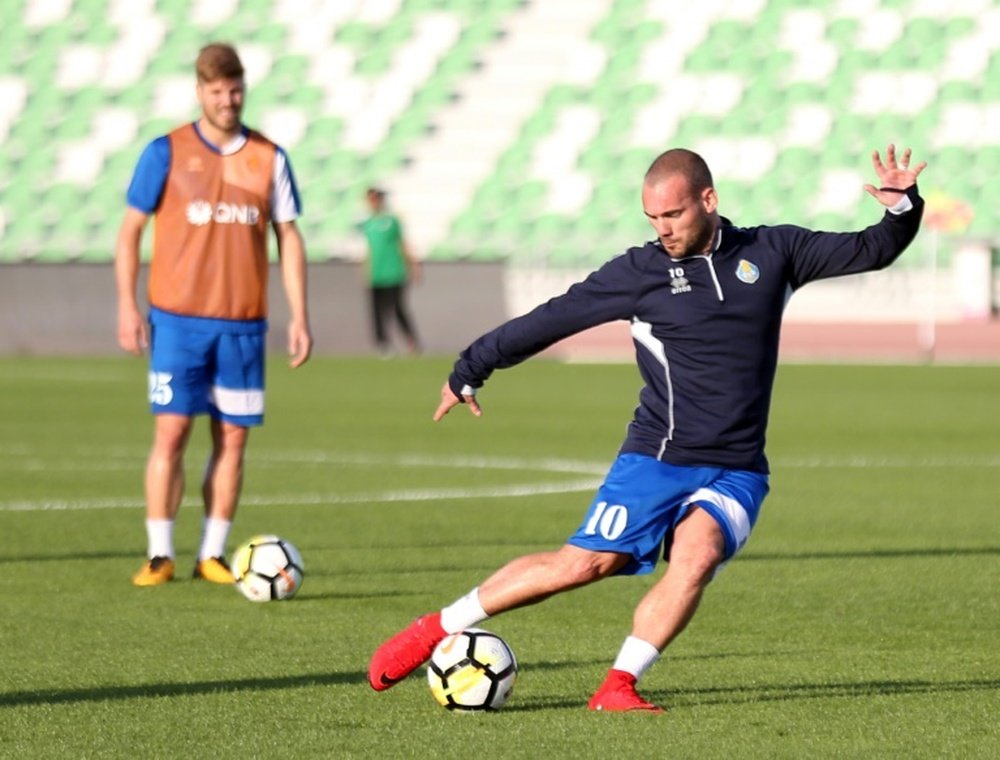 Sneijder off to winning start in Qatar. AFP