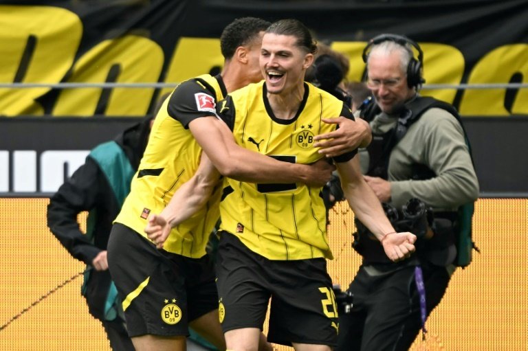 Borussia Dortmund complete escape act to snatch top-four berth