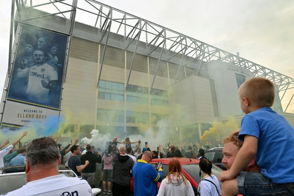 Leeds celebrate title in style at Derby, Barnsley boost survival bid. AFP