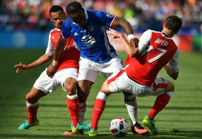 Montreal Impacts Didier Drogba (C) fights for the ball with Arsenals Krystian Bielik during an MLS All-Star match at Avaya Stadium in San Jose, California, in July 2016