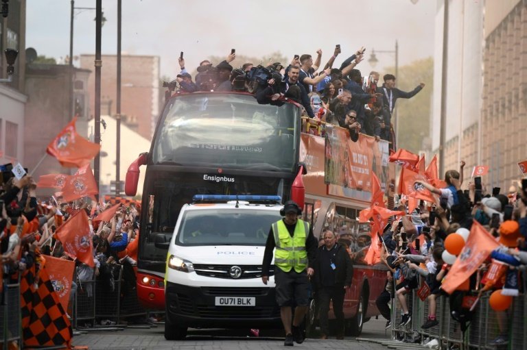 Luton celebrate Premier League promotion with bus parade