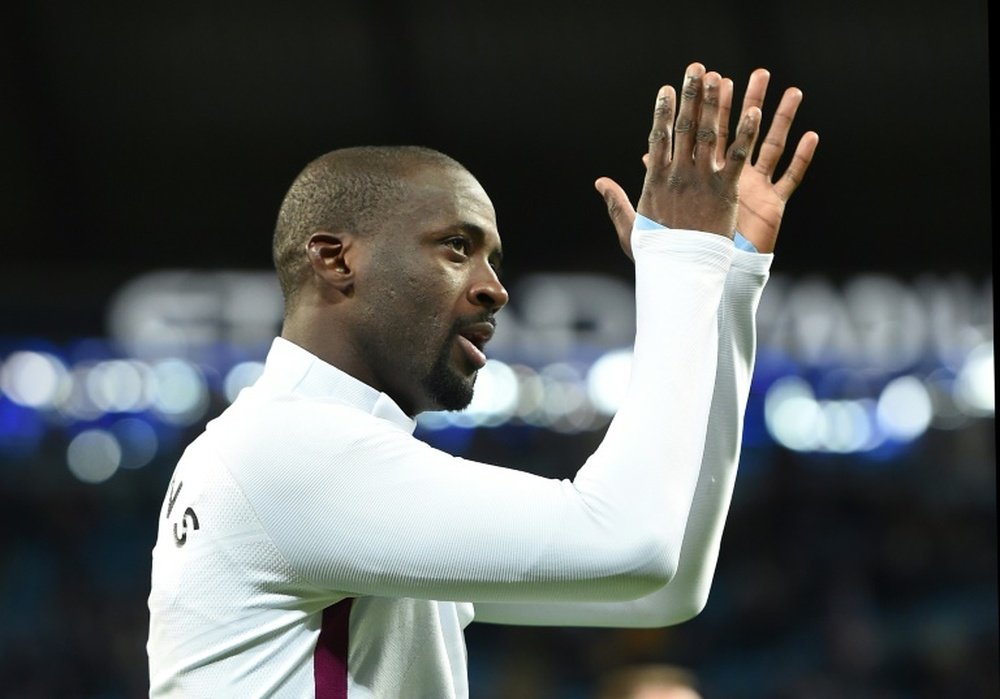 Yaya Touré signe au Qingdao Huanghai. AFP