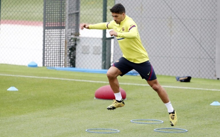 Jouer sans public sera particulier, pour Suarez. AFP