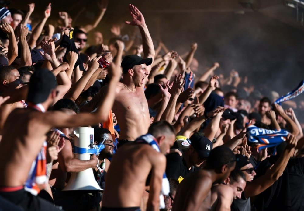 Les supporters de Montpellier lors du match face à Nîmes. AFP