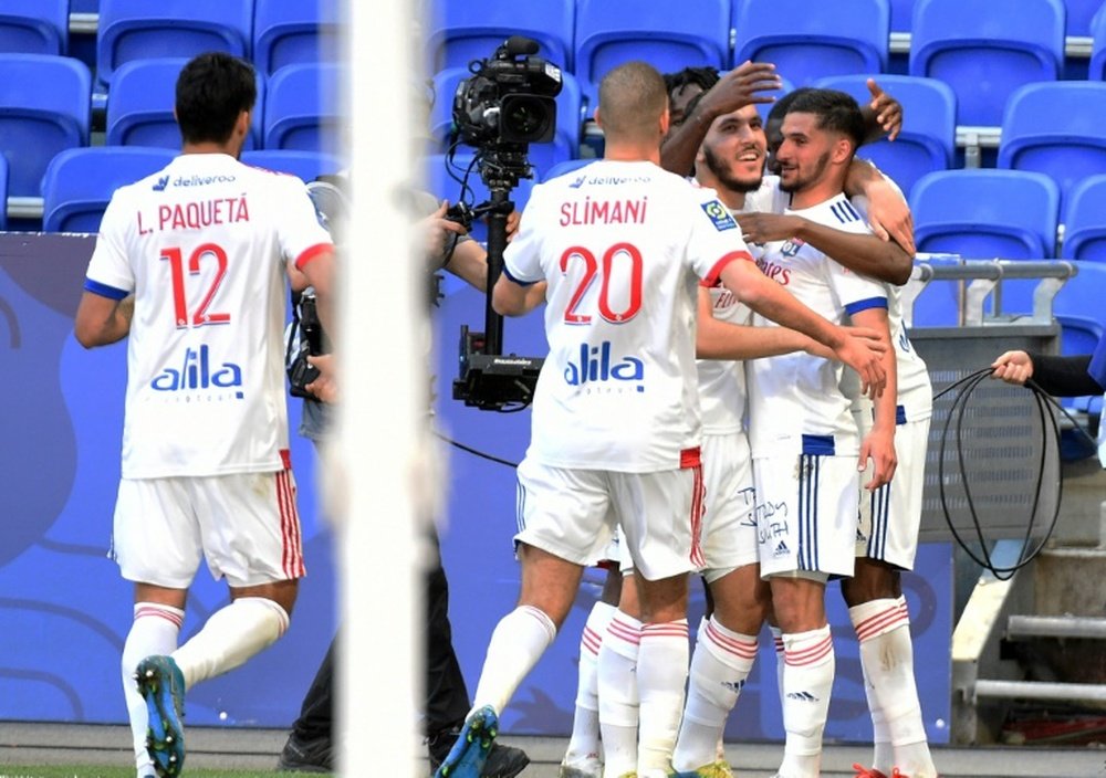 Vainqueur contre Lorient, Lyon met la pression sur Monaco. AFP
