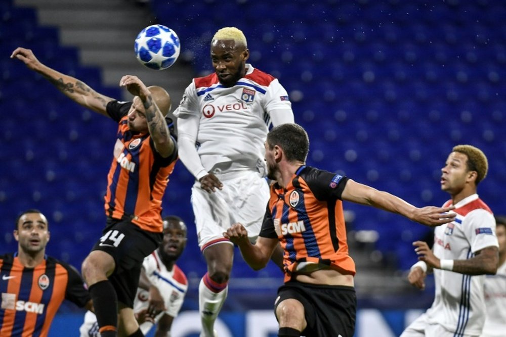 Moussa Dembélé (c) inscrit un but contre Shakhtar Donetsk en Ligue des champions. AFP