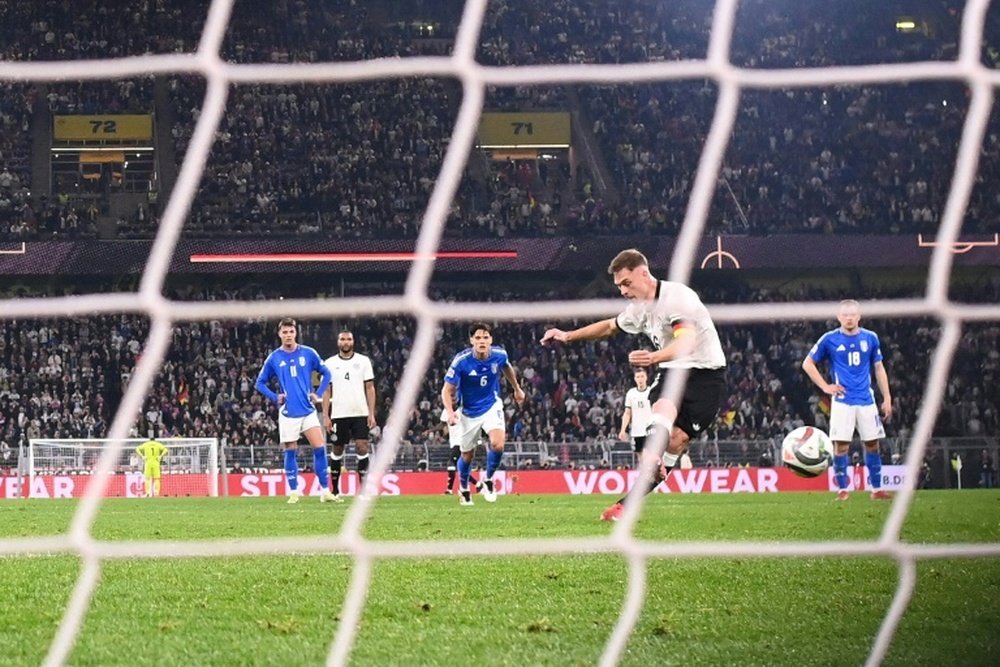 Joshua Kimmich ouvre la marque sur penalty pour l'Allemagne contre l'Italie. AFP