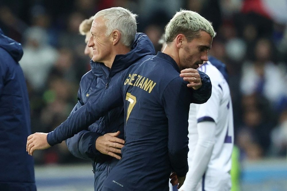 Griezmann et Deschamps. AFP