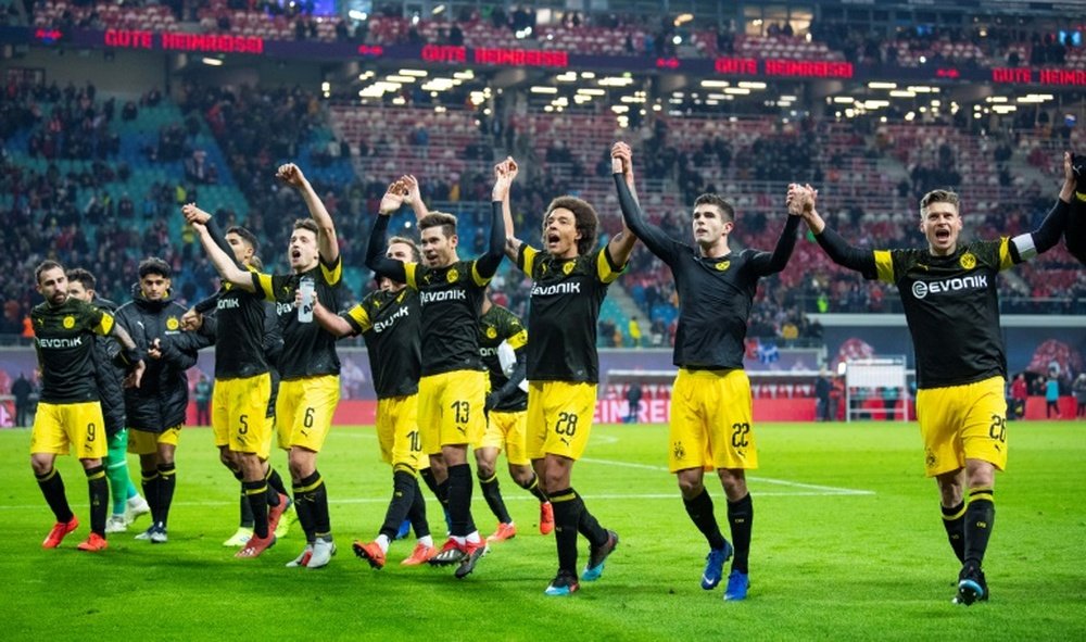 Les joueurs de Dortmund jubilent lors de la victoire à Leipzig. AFP