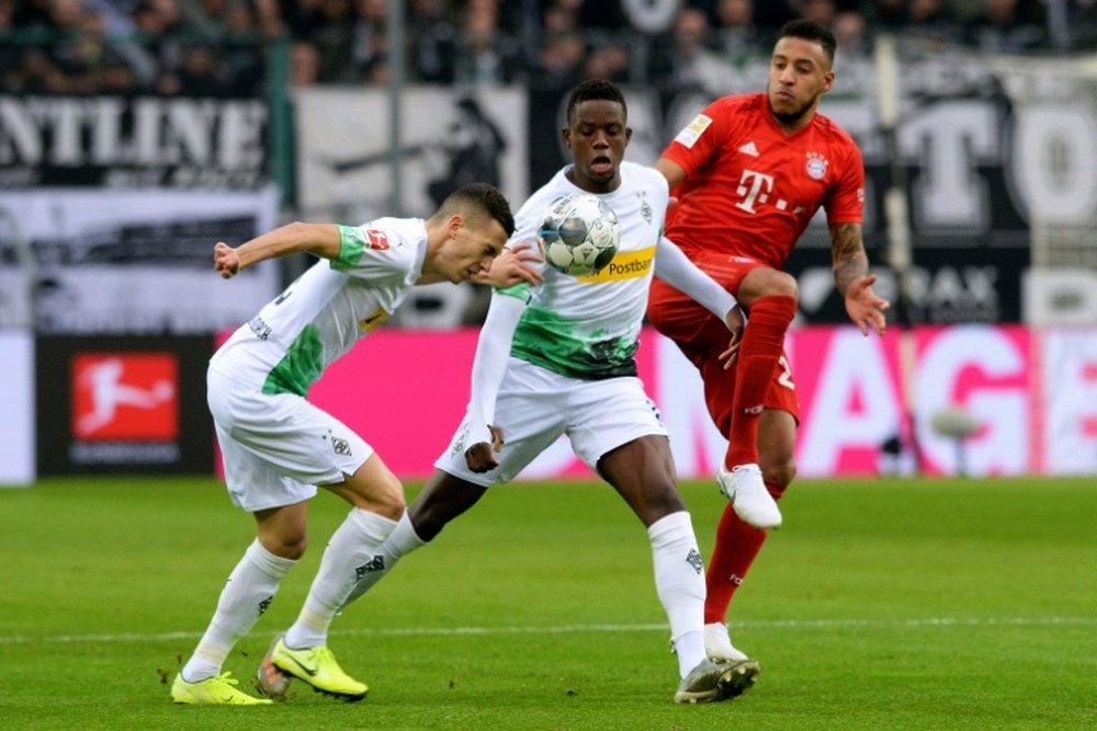 Corentin Tolisso est sorti sur blessure. AFP