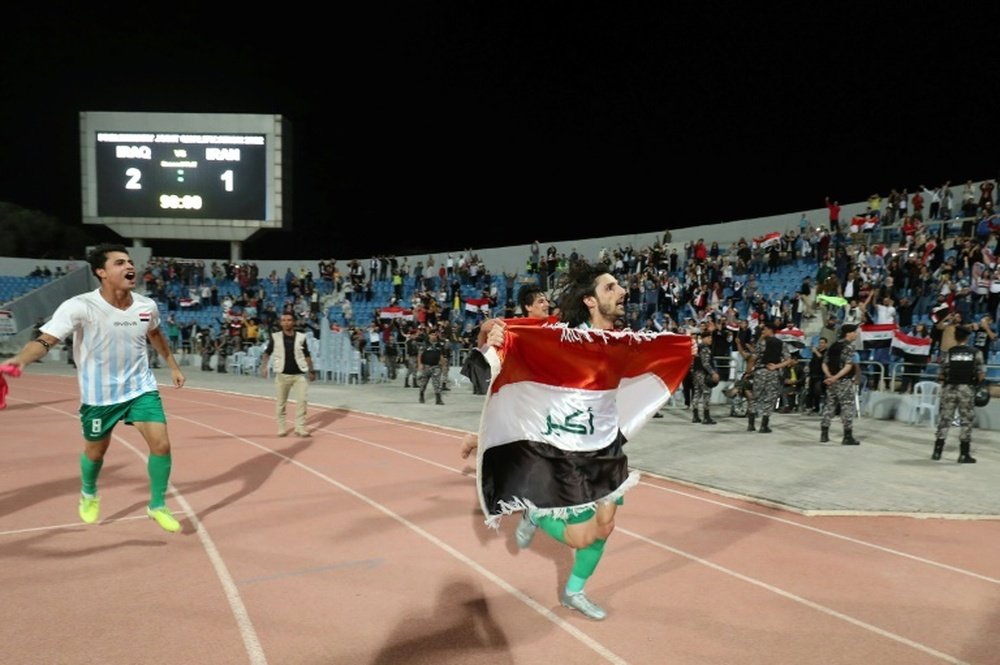 Pour les Irakiens, un message à l'Iran plus qu'une simple victoire au foot. AFP
