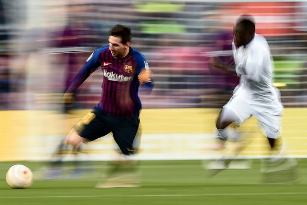 Messi est proche de remporter deux nouveaux titres. AFP