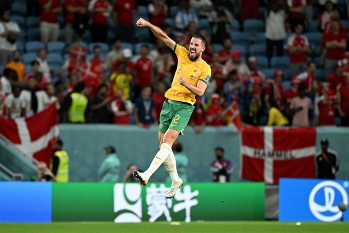 Le défenseur de l'Australie Milos Degenek célèbre la qualification de son équipe. AFP