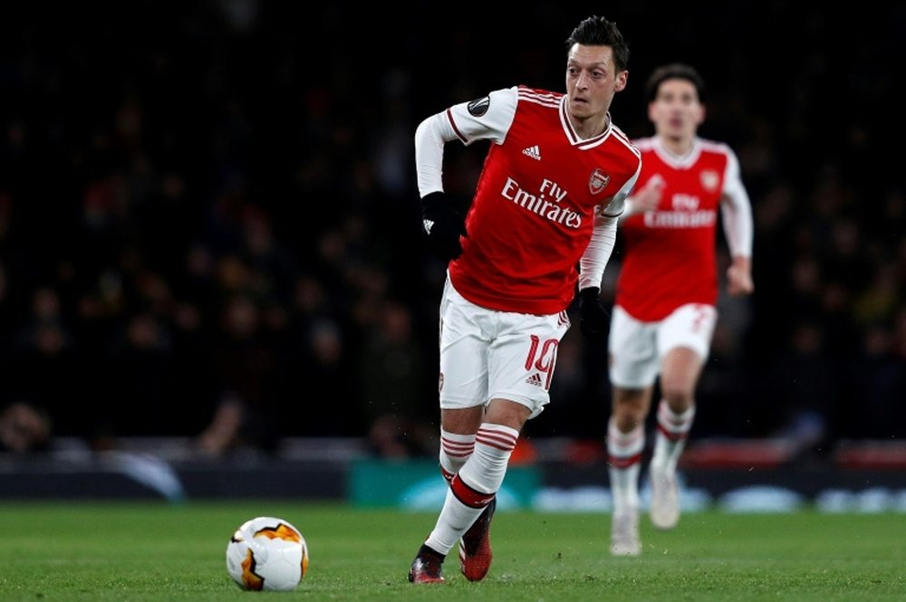 Arsenal cherche la bonne solution pour tout le monde concernant Özil. AFP