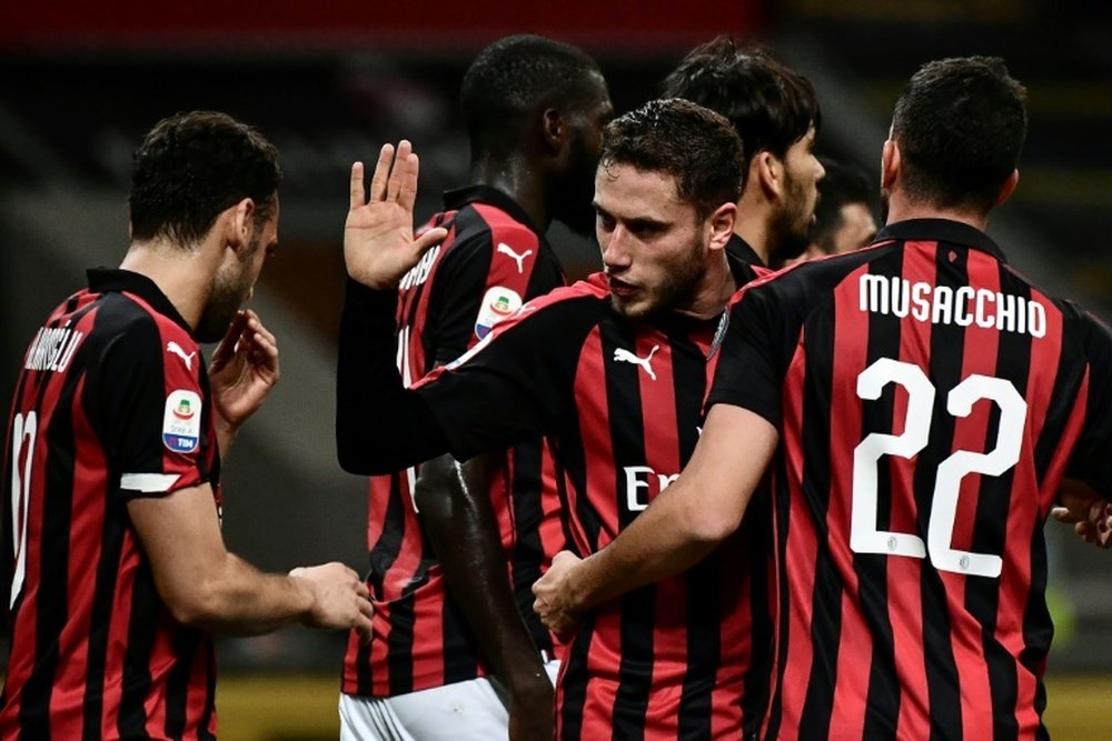 Les joueurs de Milan en liesse lors du but contre son camp du joueur de Sassuolo Lirola. AFP