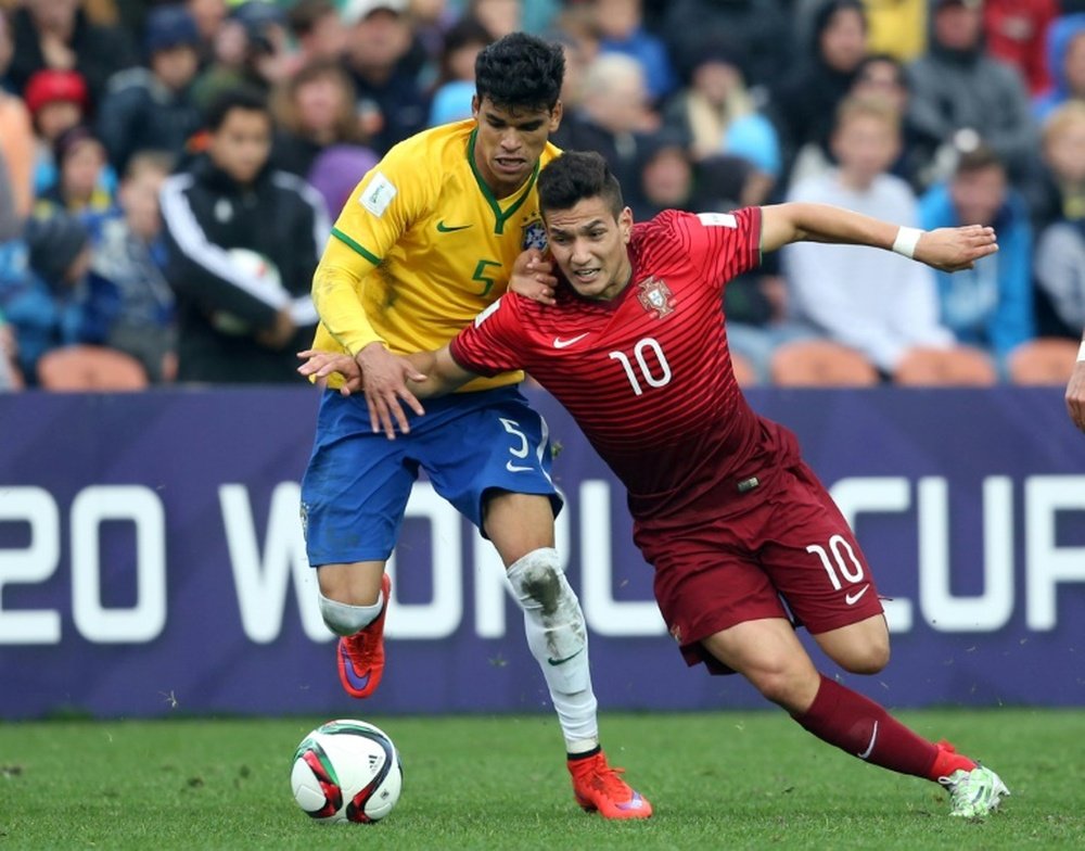 L'attaquant Rony Lopes (d) lors dun match avec la sélection portugaise au Mondial. AFP