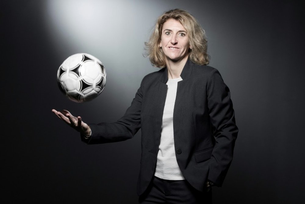La pionnière du football féminin français. AFP