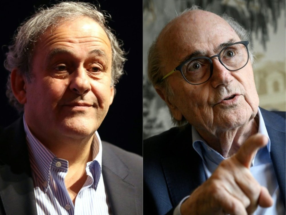 Platini et Blatter désormais poursuivis pour escroquerie en Suisse. afp