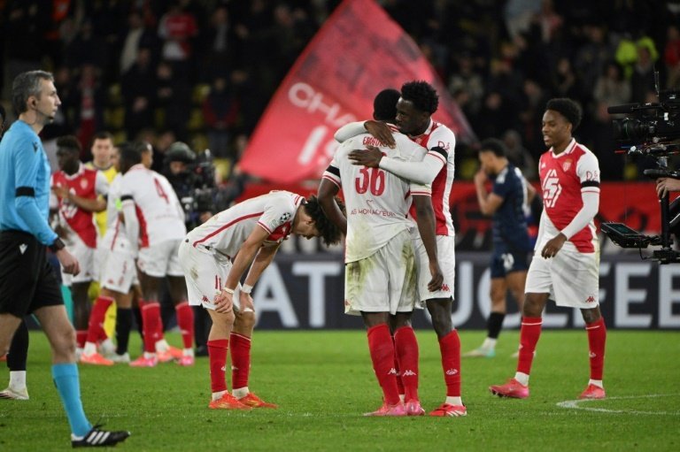 Les joueurs de Monaco célèbrent leur qualification. AFP