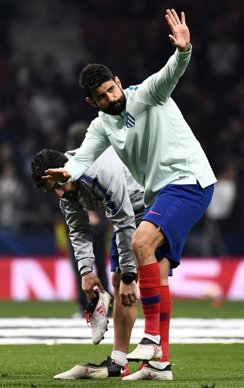 Diego Costa à l'échauffement avant le 8e de finale face à la Juve. AFP