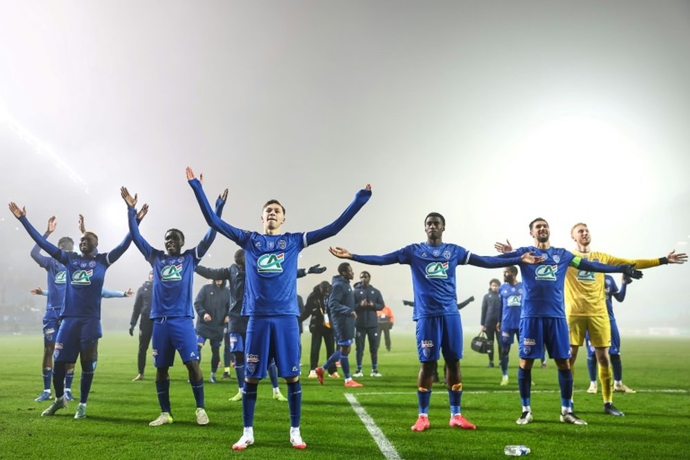 Les joueurs de Troyes fêtent leur victoire en 16e de finale de la Coupe. AFP