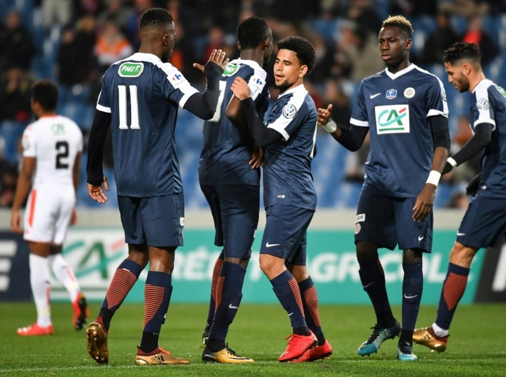 Les joueurs de Montpellier se congratulent après un but face à Lorient. AFP