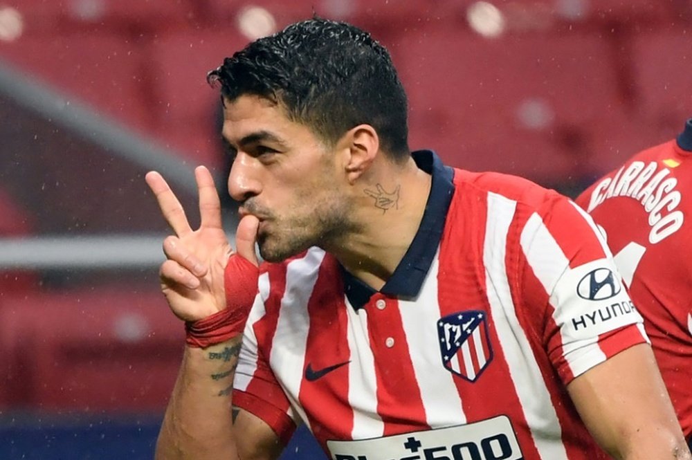 Suárez retrouve le chemin du but, l'Atlético reste leader. AFP