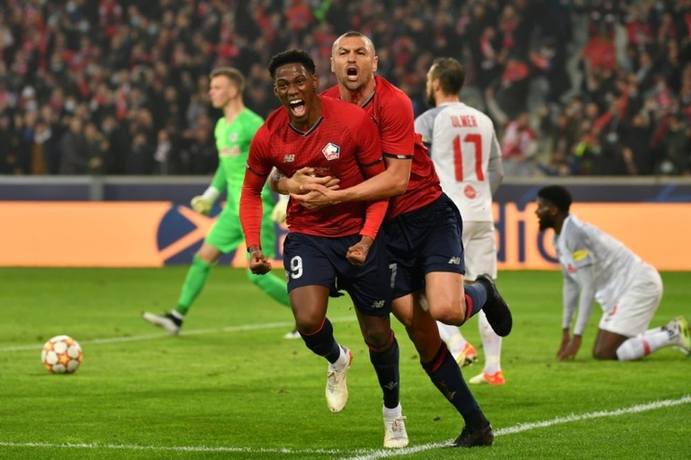 Lille en pole, Manchester United qualifié. AFP