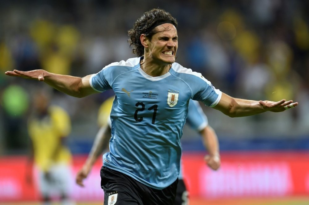 L'attaquant de l'Uruguay Edinson Cavani après avoir inscrit un but contre l'Equateur. AFP
