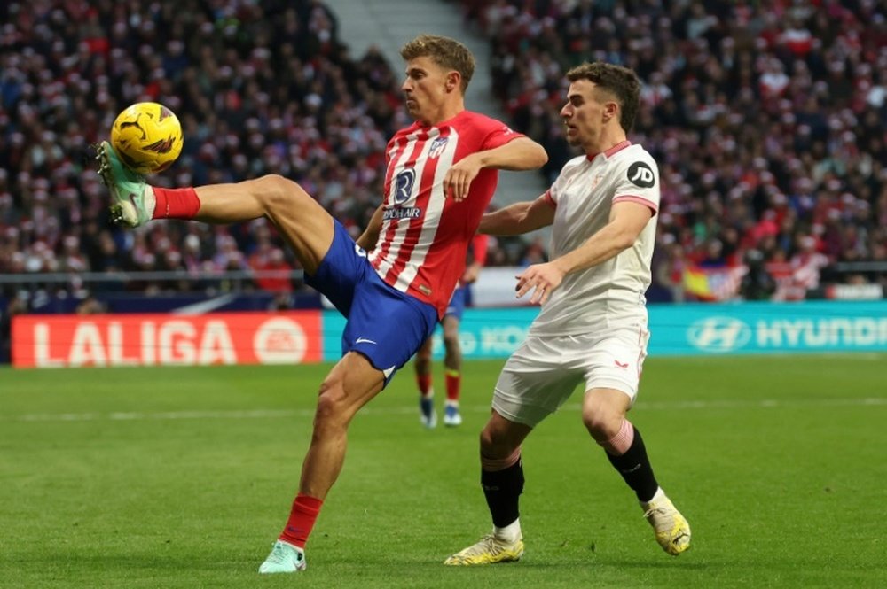 L'Atlético bat Séville en match en retard et grimpe sur le podium. afp