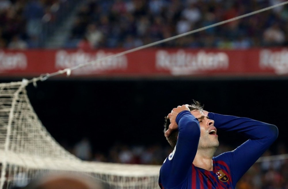 Le défenseur du FC Barcelone Gerard Piqué lors du match face à Gérone. AFP