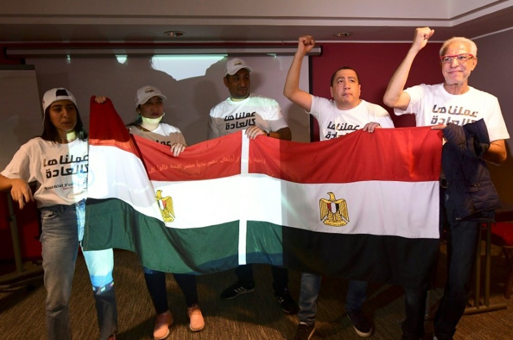 Les représentants de la candidature égyptienne ravis après la désignation de leur pays. AFP