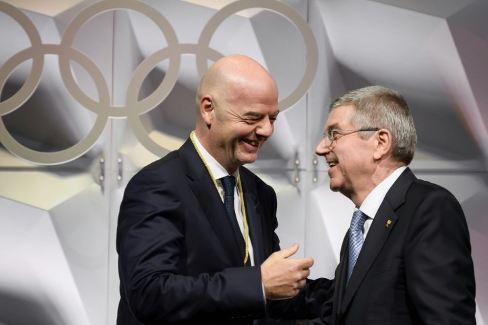 La FIFA salue le report des Jeux Olympiques. AFP