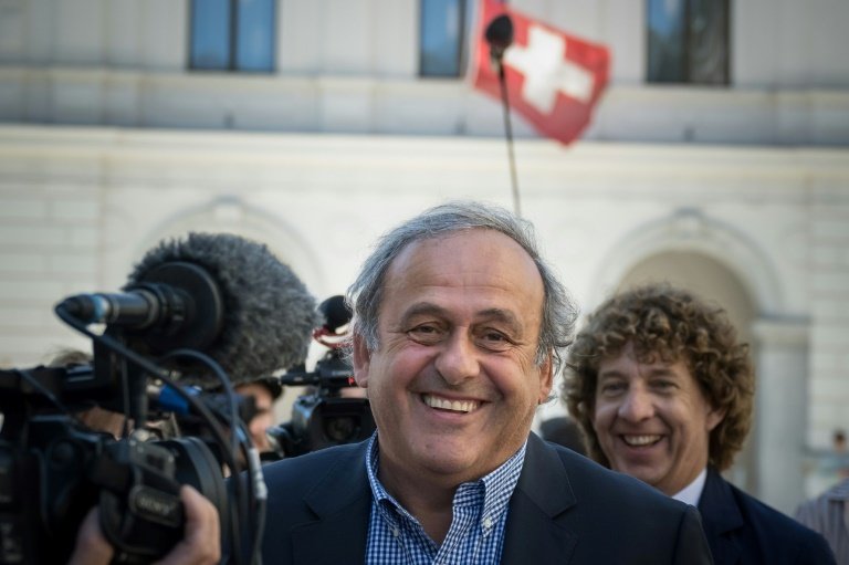 Platini, coups francs, coups durs et coups de théâtre. AFP