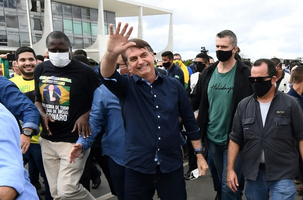 Bolsonaro veut que le foot reprenne, malgré la pandémie. AFP