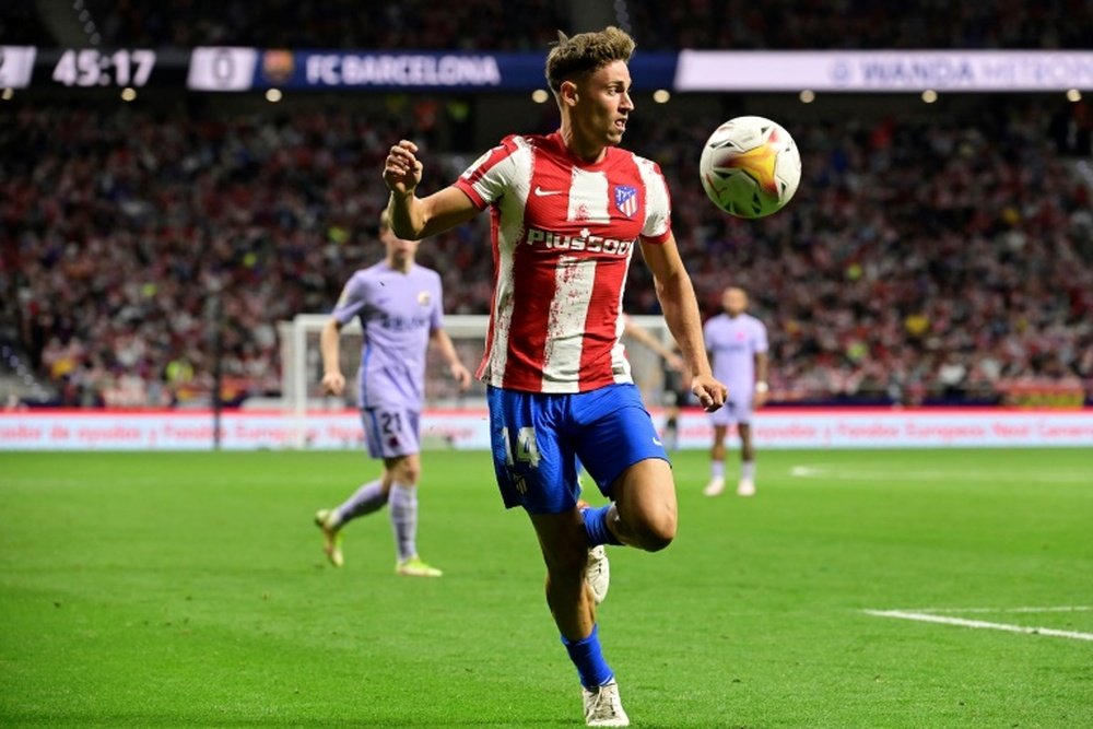 C1: Llorente et Milner, hommes à tout faire de l'Atlético et de Liverpool. AFP